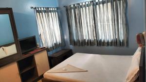 Postel nebo postele na pokoji v ubytování HOTEL MTM