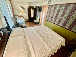 Un ou plusieurs lits dans un hébergement de l'établissement Shaka Shak Guest House