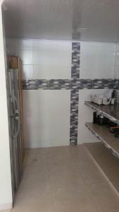 Kuchyň nebo kuchyňský kout v ubytování Tu apartamento