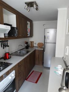 Kuchyň nebo kuchyňský kout v ubytování Apart & Tour