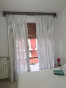 Een bed of bedden in een kamer bij Alloggio Maria