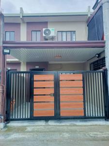 a house with a gate in front of it at 6 - Affordable 2-Storey House in Cabanatuan City in Cabanatuan