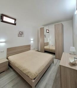 Postel nebo postele na pokoji v ubytování Casa Junno