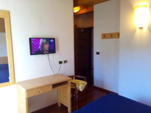 TV a/nebo společenská místnost v ubytování B&B Casa Bazzanella