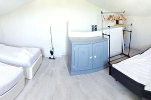 Gîte Bin Benaise draps et serviettes compris客房内的一张或多张床位