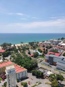 an aerial view of a city and the ocean at Dieyra Homestay in Kuala Terengganu