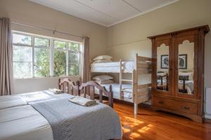 Postel nebo postele na pokoji v ubytování Tygerfontein Safari Villa