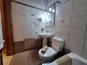 Koupelna v ubytování Skourgias Rooms