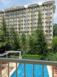 a view of a building from the balcony of a hotel at Camella north point 2 bedroom in Davao City