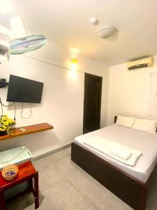 Giường trong phòng chung tại Motel Du Mỹ Hân