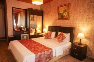 Postel nebo postele na pokoji v ubytování Eskibağ Butik Hotel