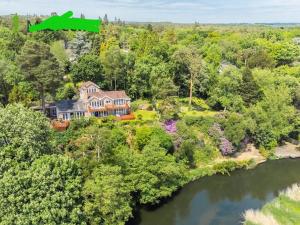 an aerial view of a large house with a river at Guest suite Annex private room in Saint Ives