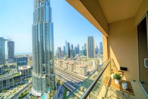 Nespecifikovaný výhled na destinaci Dubaj nebo výhled na město při pohledu z apartmánu
