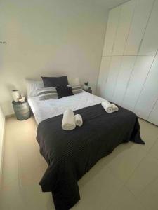 En eller flere senge i et værelse på Superbe Penthouse Terrasse avec vue Mer