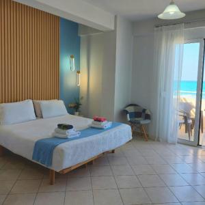 Posteľ alebo postele v izbe v ubytovaní SEPERI sea & sun + 37 fotografií