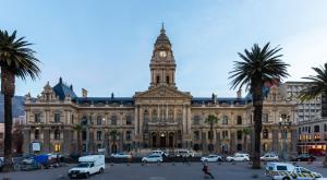 a large building with a clock tower on top of it at Home Away on Plein in Cape Town