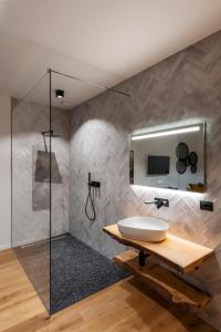 a bathroom with a sink and a mirror at Borgo Rotondo in San Giovanni in Persiceto
