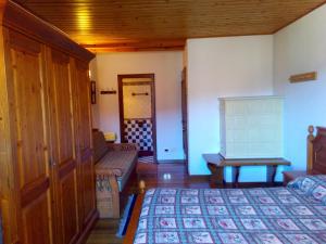 Postel nebo postele na pokoji v ubytování B&B Casa Bazzanella