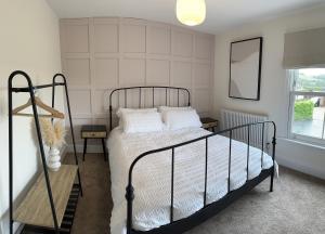 Ein Bett oder Betten in einem Zimmer der Unterkunft Ivy Cottage Derbyshire