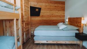 Voodi või voodid majutusasutuse Appartement Alpenrauschen toas