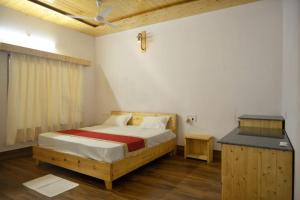 Postel nebo postele na pokoji v ubytování Gill Resort