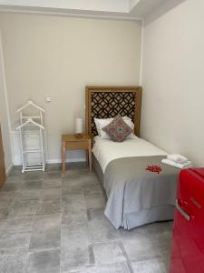 Ένα ή περισσότερα κρεβάτια σε δωμάτιο στο Hotel Altes Fährhaus