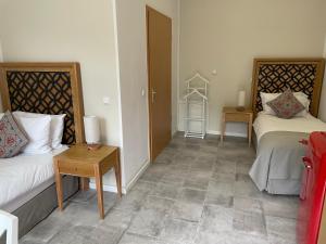 Ένα ή περισσότερα κρεβάτια σε δωμάτιο στο Hotel Altes Fährhaus +108 φωτογραφίες