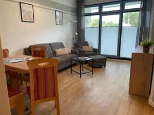 Posezení v ubytování Ferienwohnung Fehmarn am Südstrand