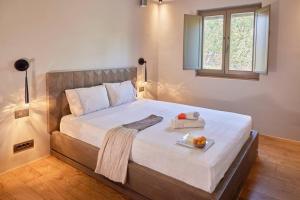 Postel nebo postele na pokoji v ubytování Casa Aurelia + 27 fotografií