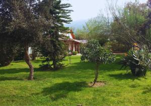 Jardín al aire libre en Hostería y Spa Llano Real