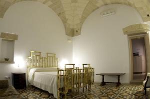 Posteľ alebo postele v izbe v ubytovaní Residence Castello Otranto