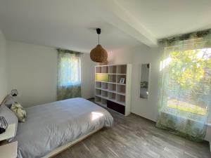 מיטה או מיטות בחדר ב-Villa Exclusive