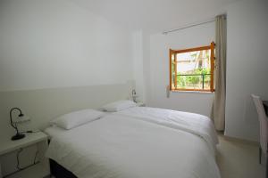 Katil atau katil-katil dalam bilik di Apartmani Dub