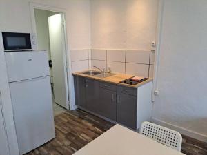 Η κουζίνα ή μικρή κουζίνα στο BudgetBnb 282, studio centre-ville
