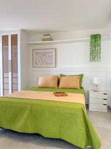 Giường trong phòng chung tại JT Prime - Casa Praia da Pipa #7