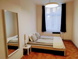 Postel nebo postele na pokoji v ubytování Apartman Coral
