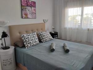 Postel nebo postele na pokoji v ubytování Apartamentos CH 2
