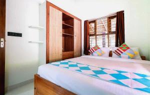 Uma cama ou camas num quarto em Flagship Atharvam Resort