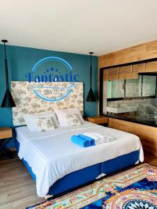 Postel nebo postele na pokoji v ubytování Fantastic Karon Beach guest house