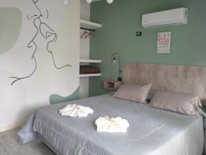 Postel nebo postele na pokoji v ubytování Sierras Alojamiento SUITE