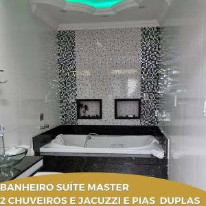 Afbeelding uit fotogalerij van Dara House apart e eventos com piscina, sauna, Jacuzzi e área gourmet para festas in Cachoeira do Campo