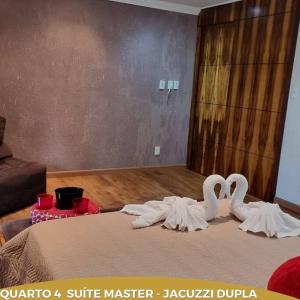 Afbeelding uit fotogalerij van Dara House apart e eventos com piscina, sauna, Jacuzzi e área gourmet para festas in Cachoeira do Campo