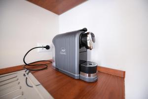 a heater sitting on a counter in a room at Appartamenti Anna in Sirmione