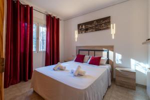 Posteľ alebo postele v izbe v ubytovaní Villa La Deseada