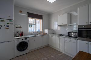 Kuchyňa alebo kuchynka v ubytovaní Villa La Deseada