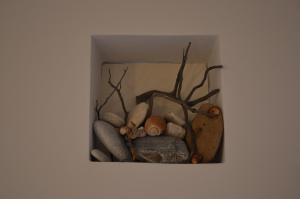 a box filled with rocks and sticks and branches at ThalaSEA - village Antiparos in Antiparos