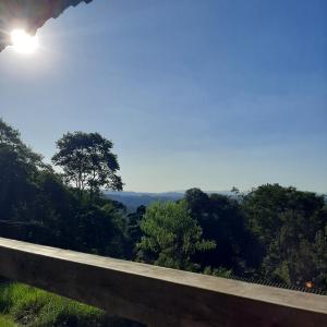 a view of the forest from a road at Embu Manacás da Serra in Embu