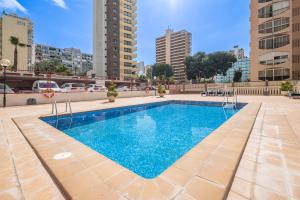Bazén v ubytovaní Loix Mar 11-E Apartment Levante Beach alebo v jeho blízkosti