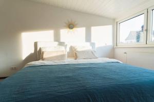 Ένα ή περισσότερα κρεβάτια σε δωμάτιο στο Loft in Eltville am Rhein - 2 DZ