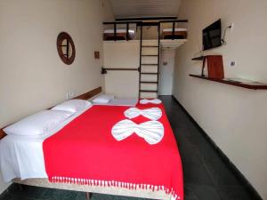 Postel nebo postele na pokoji v ubytování POUSADA DAS FLORES